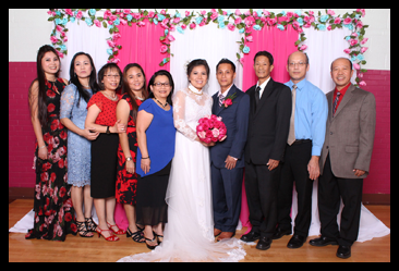 Instant portrait with wedding couple.