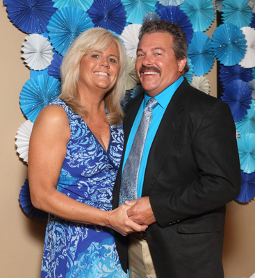 Husband and wife portrait at wedding.